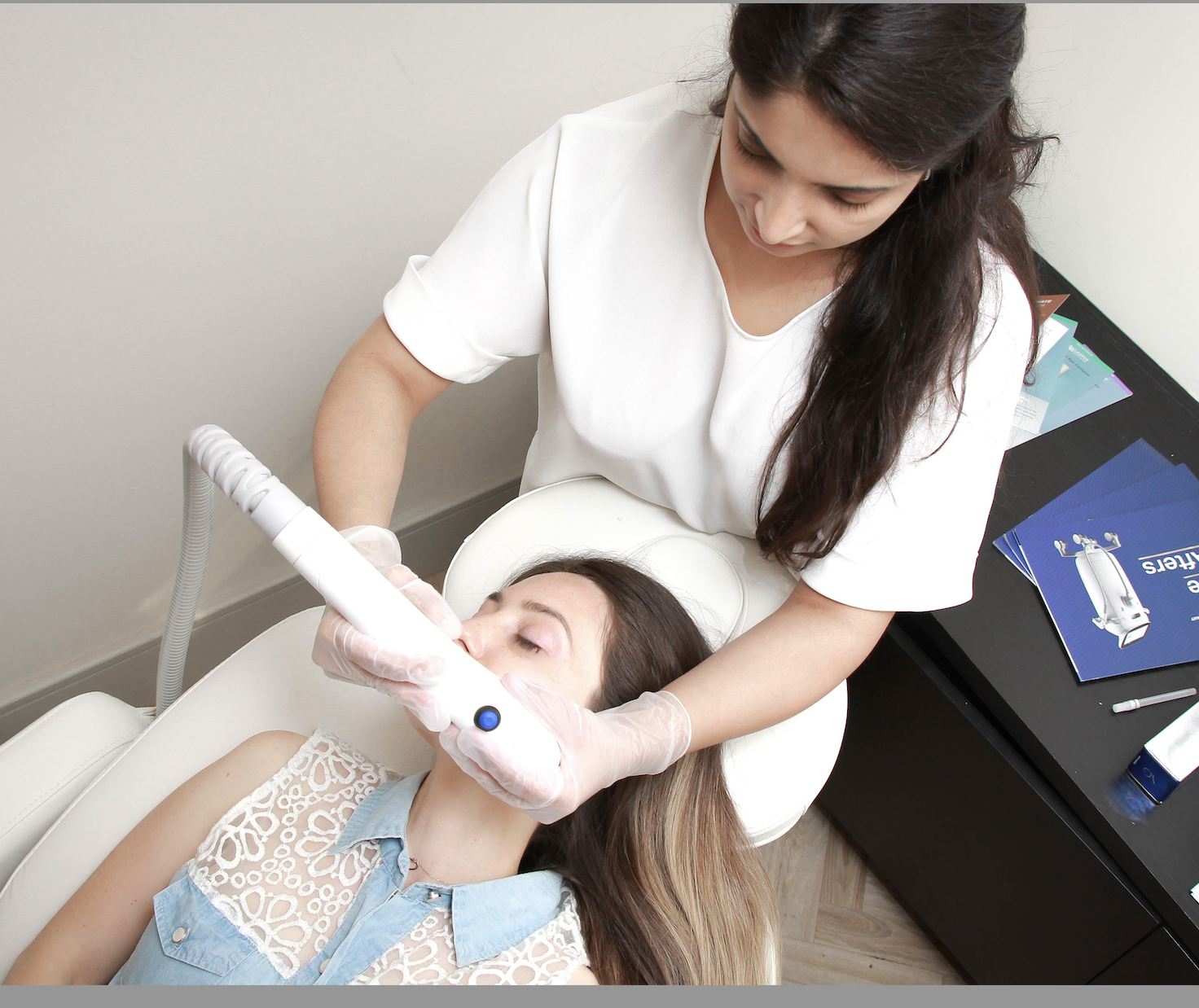 Doctor performing Sofwave ultrasound skin tightening treatment in Hampstead London